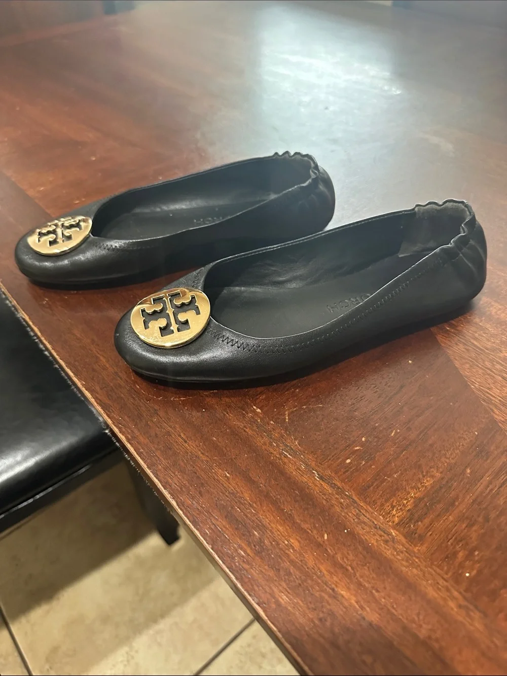 Tory Burch Black Leather Ballet Flats with Gold Logo Medallion